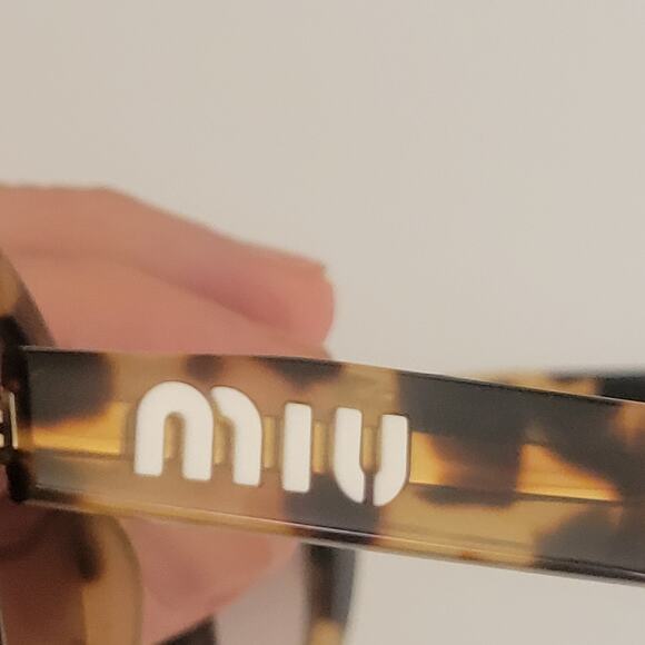 MIU MIU SMU 01U 7SO-QZ9 53x19x140 Oval sunglasses with case - Picture 6 of 11